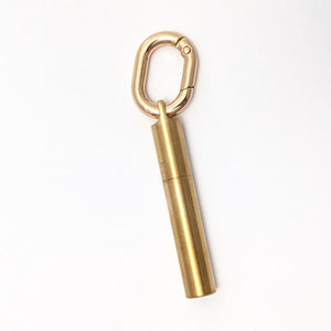 Scrivener's Tools Pen Carabiner in Gold with Tom's Studio Field Mouse pen in Brass attached via loop lid