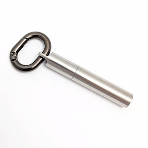 Scrivener's Tools Pen Carabiner in Gunmental with Tom's Studio Field Mouse pen in Stainless Steel attached via loop-top lid