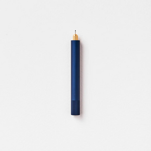Tom's Studio Lumos Mini refillable pen in Midnight (dark navy), cap posted with tip exposed, on white background