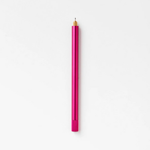 Tom's Studio Lumos Pro Single in Raspberry (deep pink), fineline tip exposed, cap posted, on textured paper