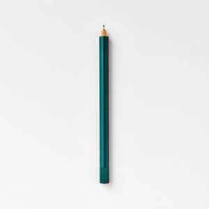 Tom's Studio Lumos Pro Single in Ivy (dark green), fineline tip exposed, cap posted, on textured paper